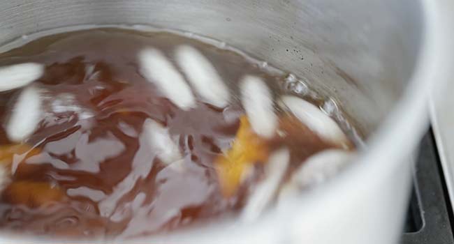 cooling a brine with ice cubes