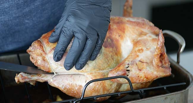 removing butcher's twine from a turkey