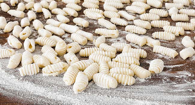 resting gnocchi on a counter