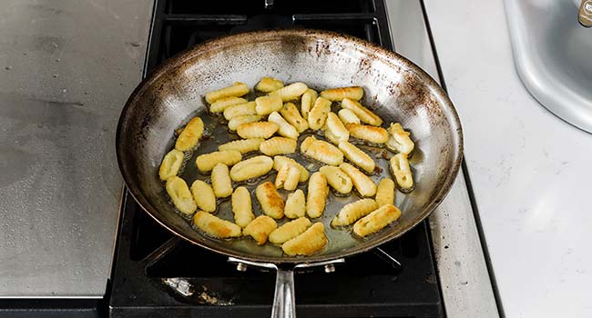 searing gnocchi in a pan