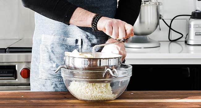 running baked potatoes through a food mill