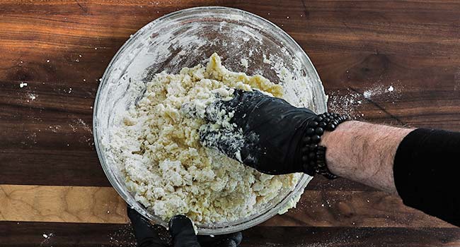 mixing together gnocchi dough