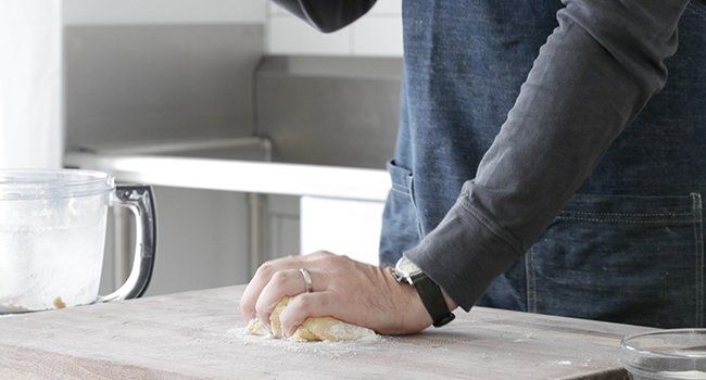 kneading pie dough