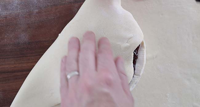 folding puff pastry over brie