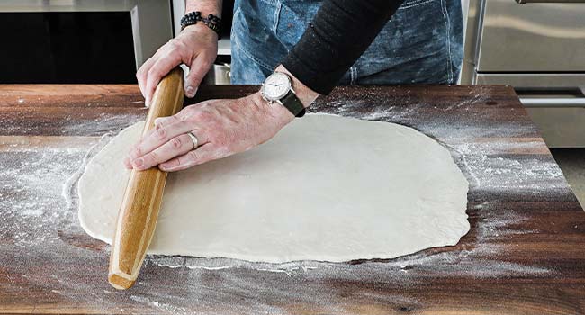 rolling out puff pastry