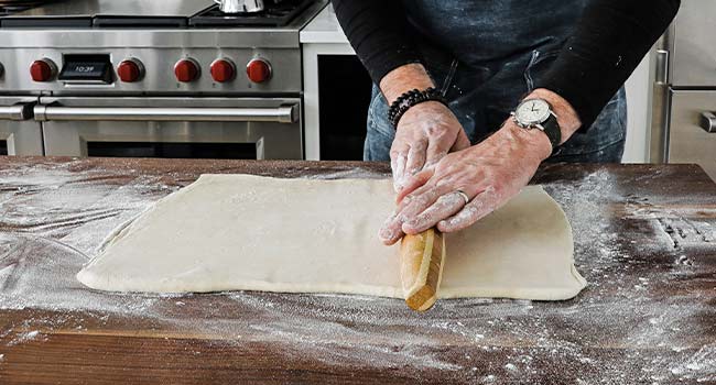 rolling back out puff pastry dough