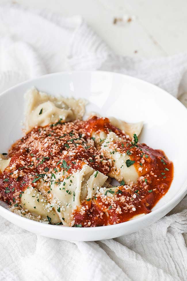 ravioli with sauce in a bowl