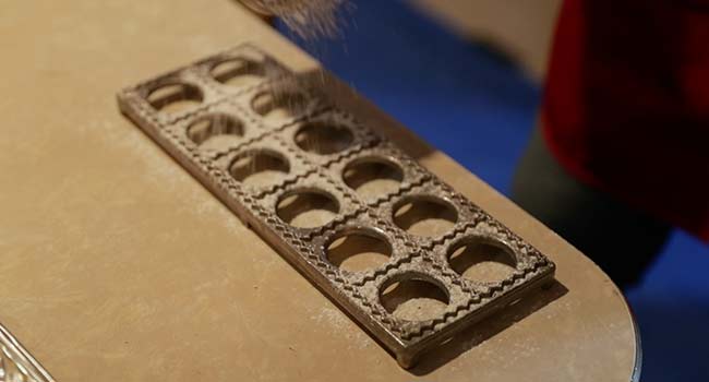 dusting a ravioli mold