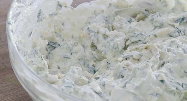 making a artichoke and spinach dip
