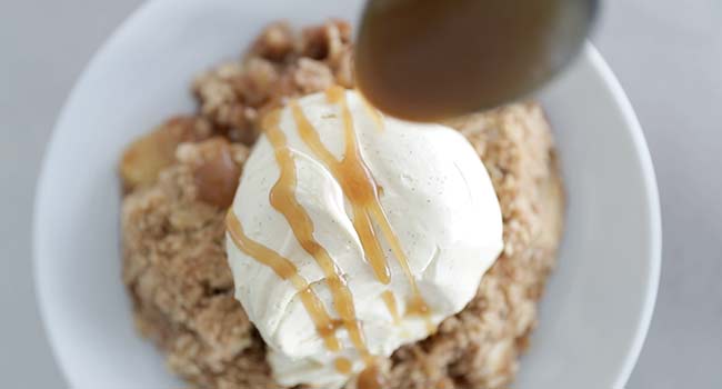 drizzling caramel on ice cream and apple crisp