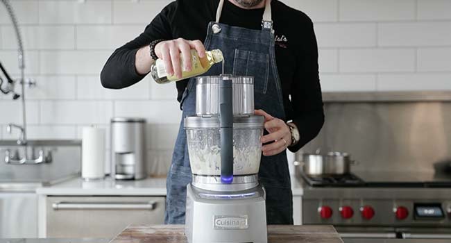 drizzling oil to a food processor