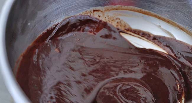 melting chocolate and cream in a bowl