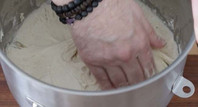 removing dough from a bowl