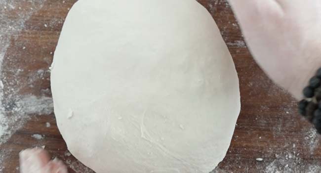 forming dough into a bowl