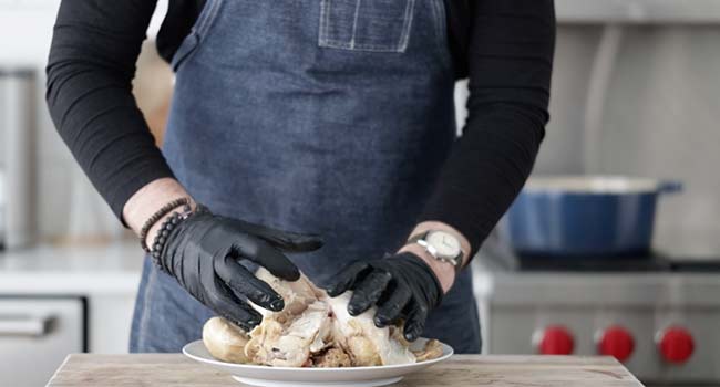 removing the skin from a cooked chicken