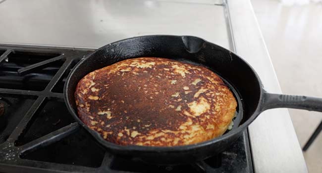 golden brown boxty in a skillet