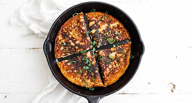 sliced potato pancakes in a skillet