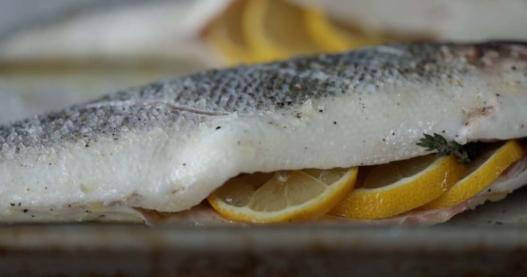 stuffing fish with lemon and thyme