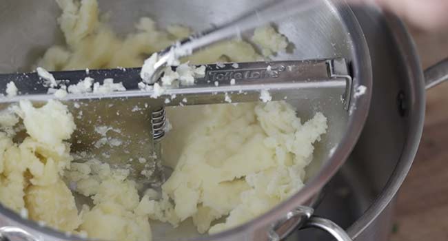 mashing potatoes