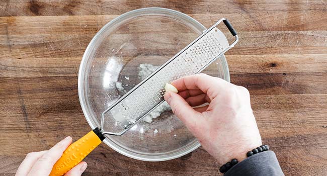 grating garlic