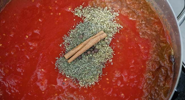 tomatoes and spices in a pan