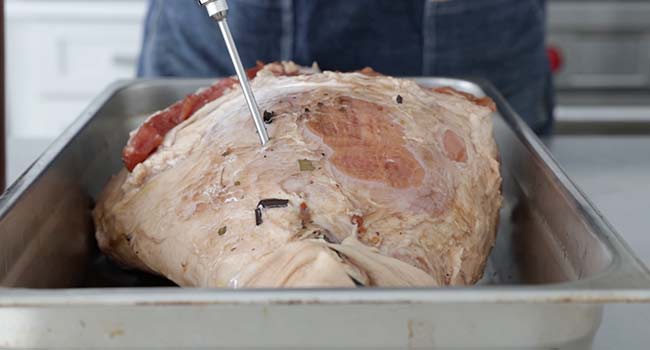 injecting brine into a cured ham