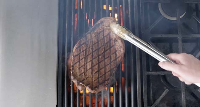 carne asada on a grill