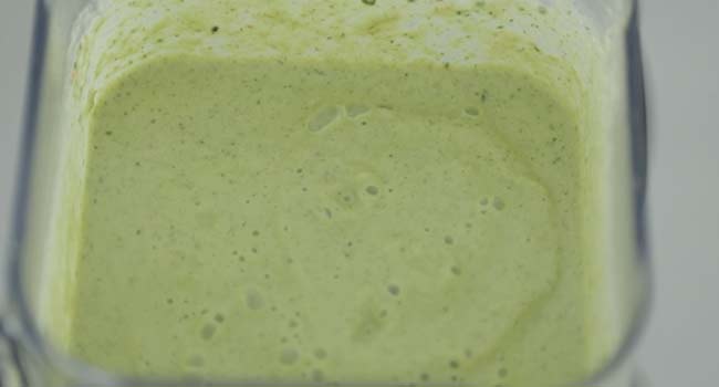 ground mole verde sauce in a blender