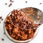 achiote paste in a jar and on a spoon