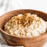 arroz con leche in a bowl with cinnamon