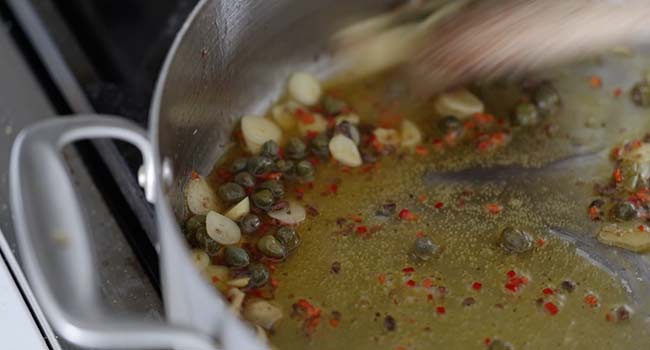 cooking capers with garlic