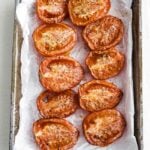 oven roasted tomatoes on a sheet tray