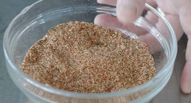 mixing together a southwest seasoning blend