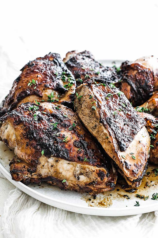 Marinated grilled chicken on a plate