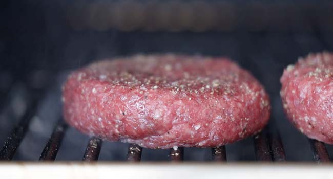 cooking ground beef in a smoker