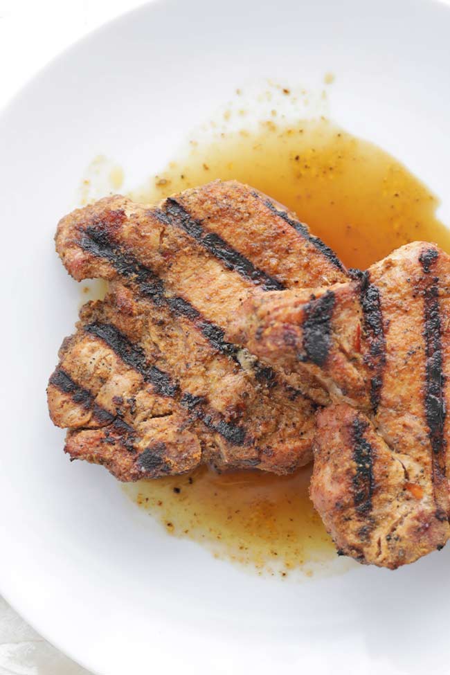 grilled pork chops on a plate