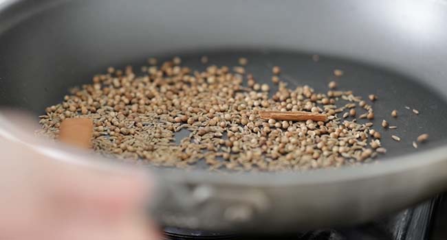 toasting spices in a pan