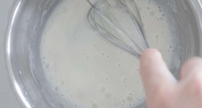 whisking flour and water