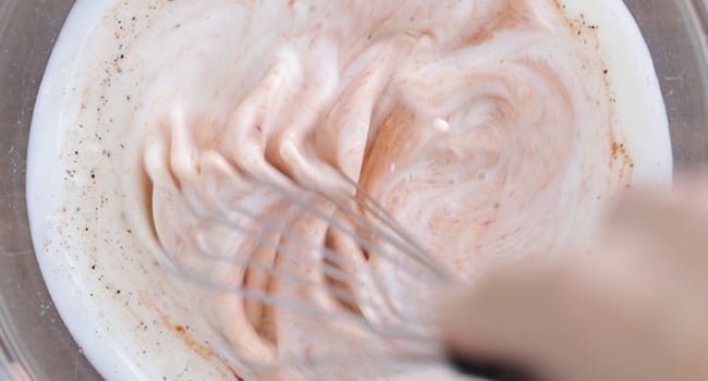 whisking together buttermilk