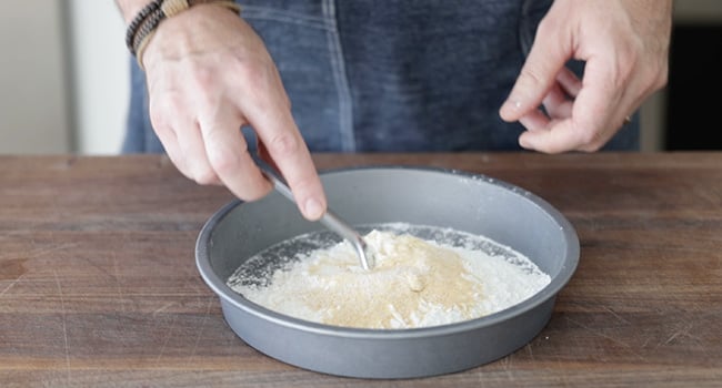 mixing flour with spices