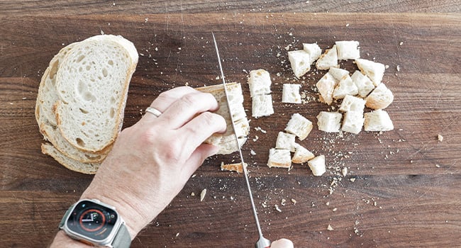 cutting bread into cubes