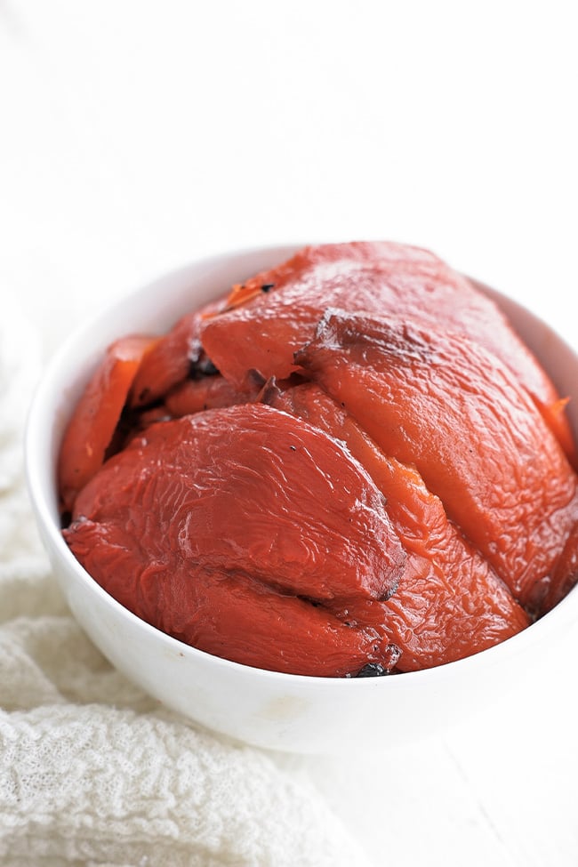 roasted red peppers on a bowl