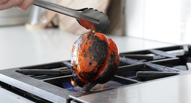 roasting pepper on a cook top