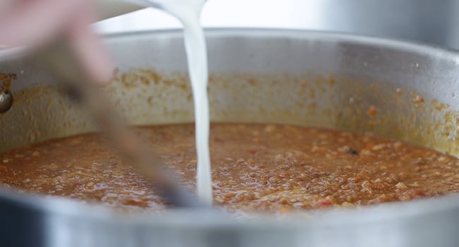 adding milk to bolognese