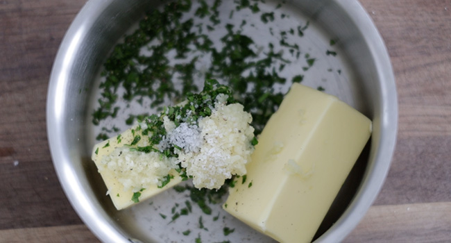 butter and herbs in a pan