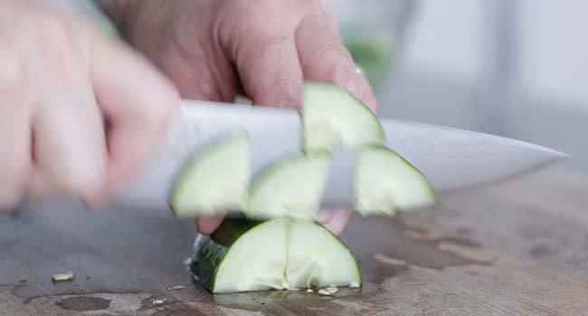 slicing a cucumber