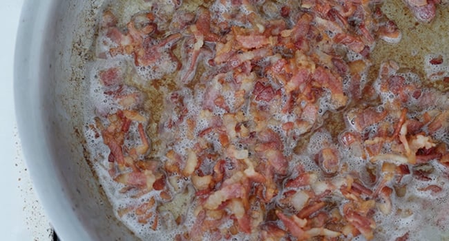 cooking bacon in a pot