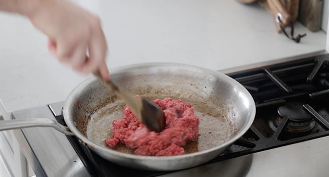 cooking ground beef in a pan