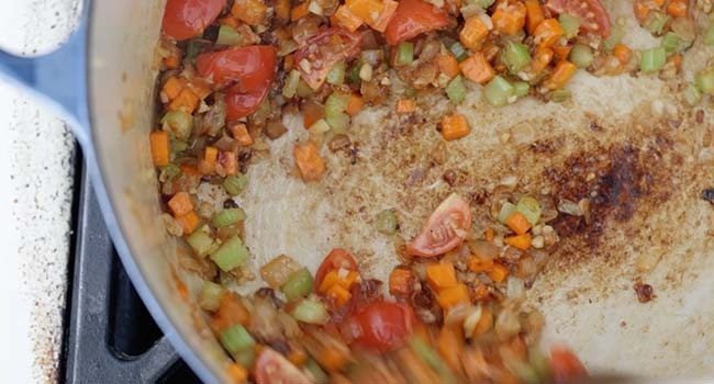 cooking tomatoes and vegetables