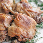 duck confit on a plate